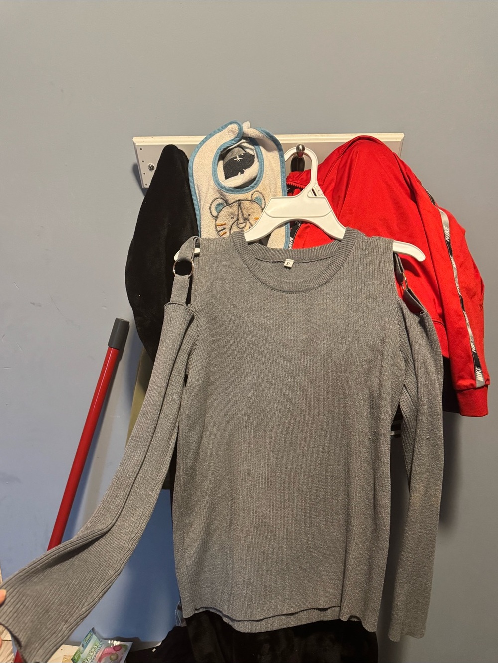 Long sleeve grey waffle knit blouse with silver ring cut out shoulder style